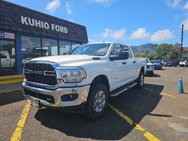 2024 RAM 2500 Big Horn 4x4 Crew Cab 6'4" Box in Bright White Clearcoat — front three-quarter view